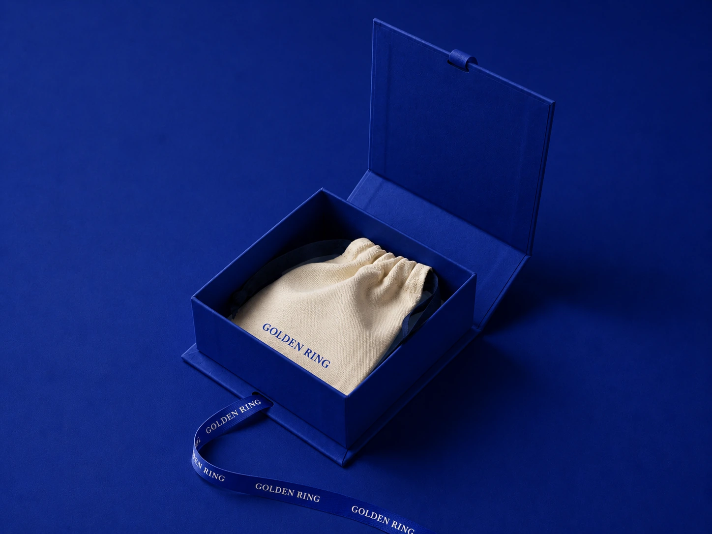 Golden Ring royal blue gift box with branded jewelry pouch